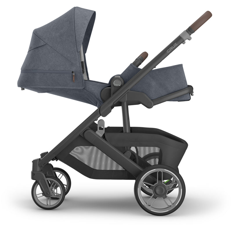 Side profile of Uppababy Cruz V3 Stroller Julian, travel system stroller with smooth suspension and durable frame