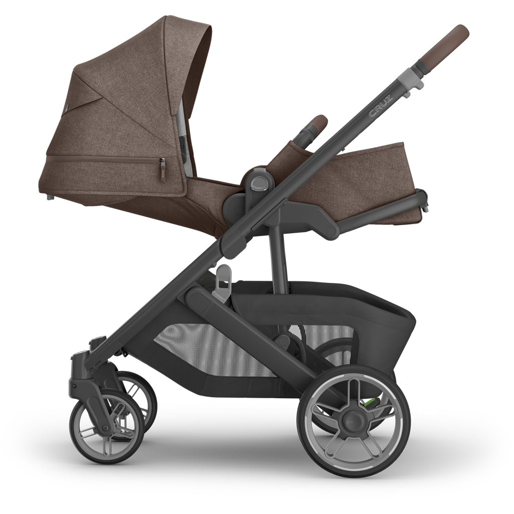 Closeup of wheels and suspension on uppababy Cruz V3 Stroller Owen, best stroller choice for infant comfort