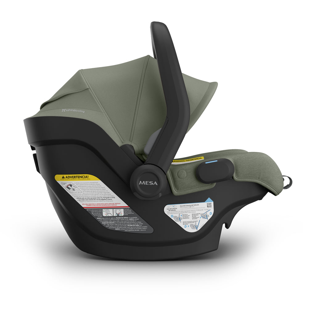 Extended sunshade on Uppababy Mesa V3 Infant Car Seat Evelyn green showing lightweight infant car seat