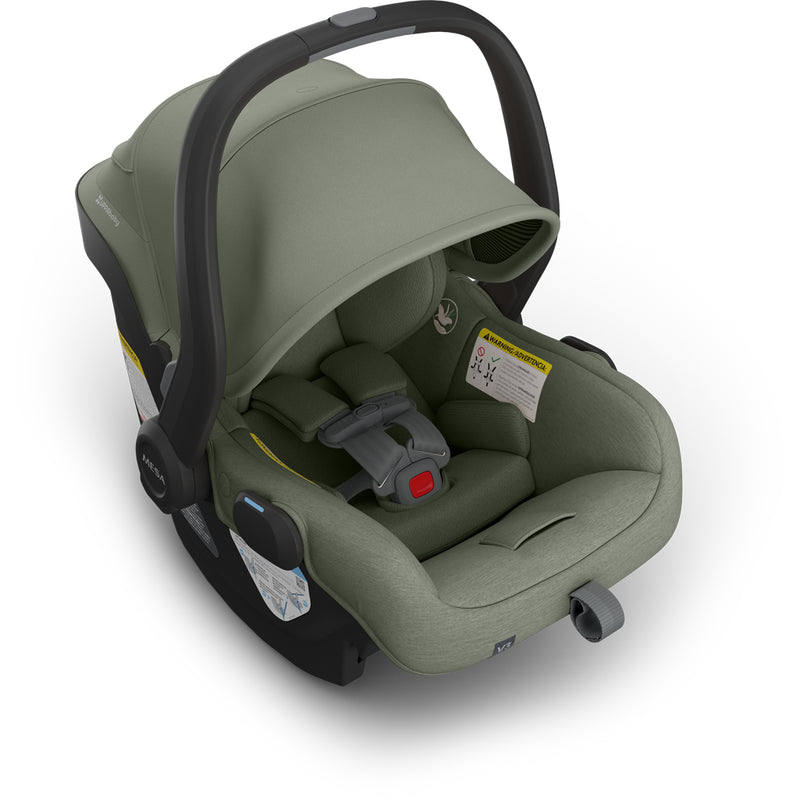Carry handle close-up of Uppababy Mesa V3 Infant Car Seat Evelyn green showcasing lightweight infant car seat