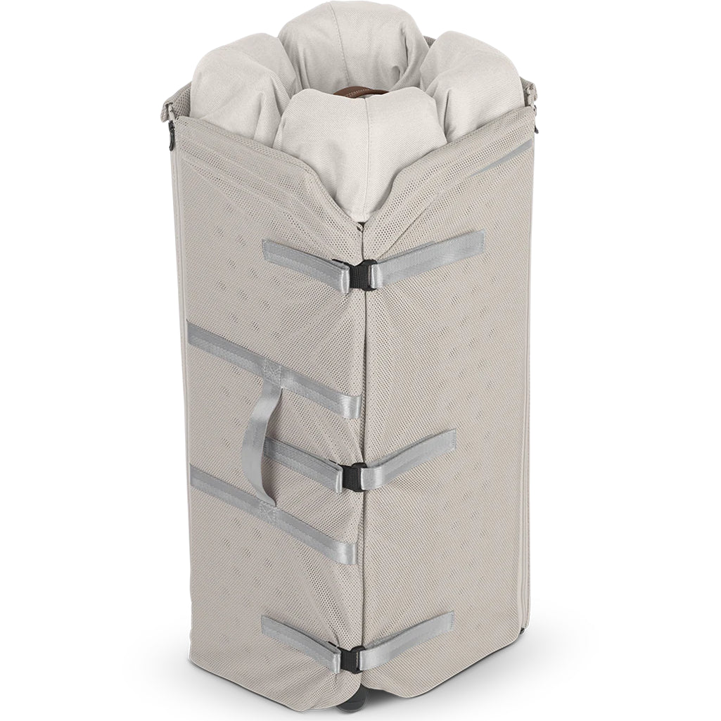 folded uppa baby playard white travel crib