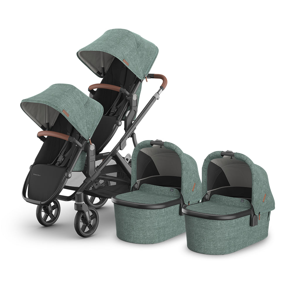 Angled view of UPPAbaby Vista V3 Twin Double Stroller in Gwen, includes bassinet and rumbleseat, a travel system stroller
