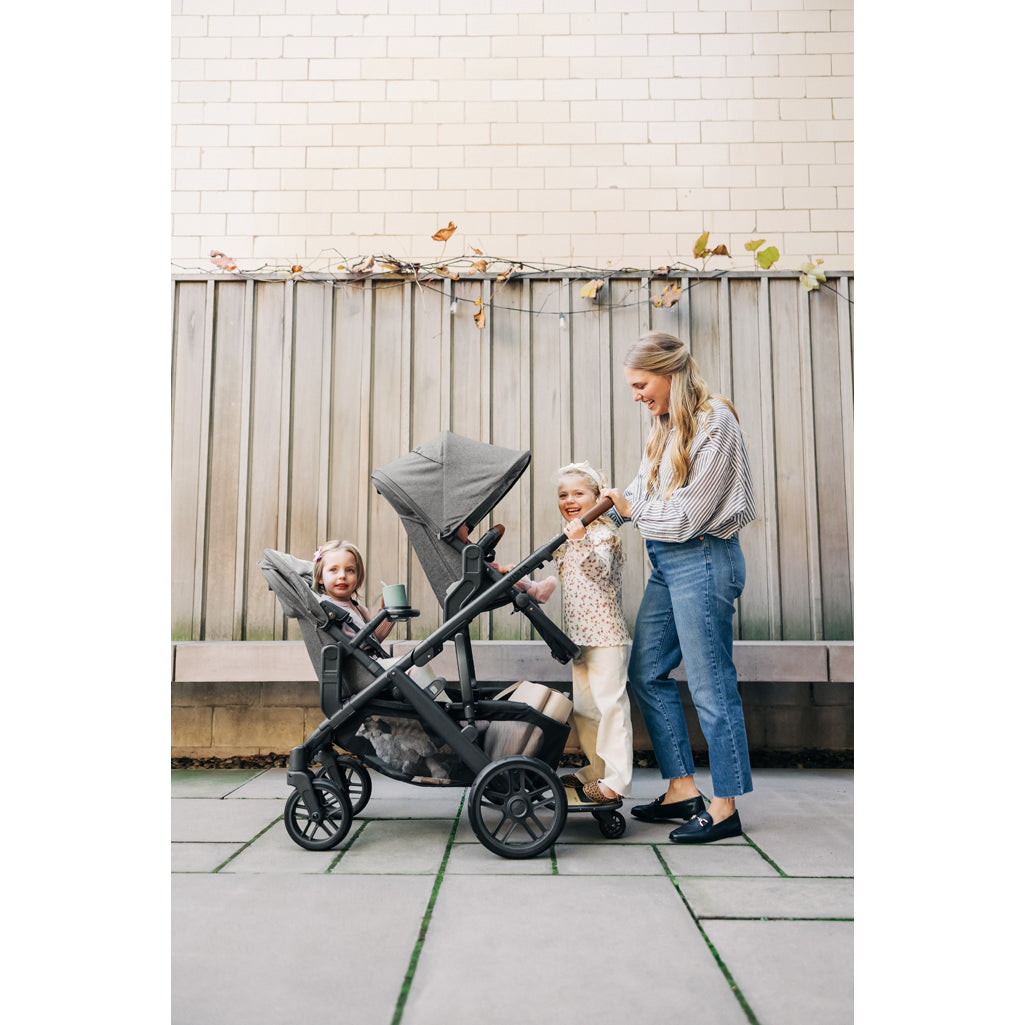 Urban-ready UPPAbaby Vista V3 Twin Double Stroller shown with two bassinets, smart adjustable stroller seat system