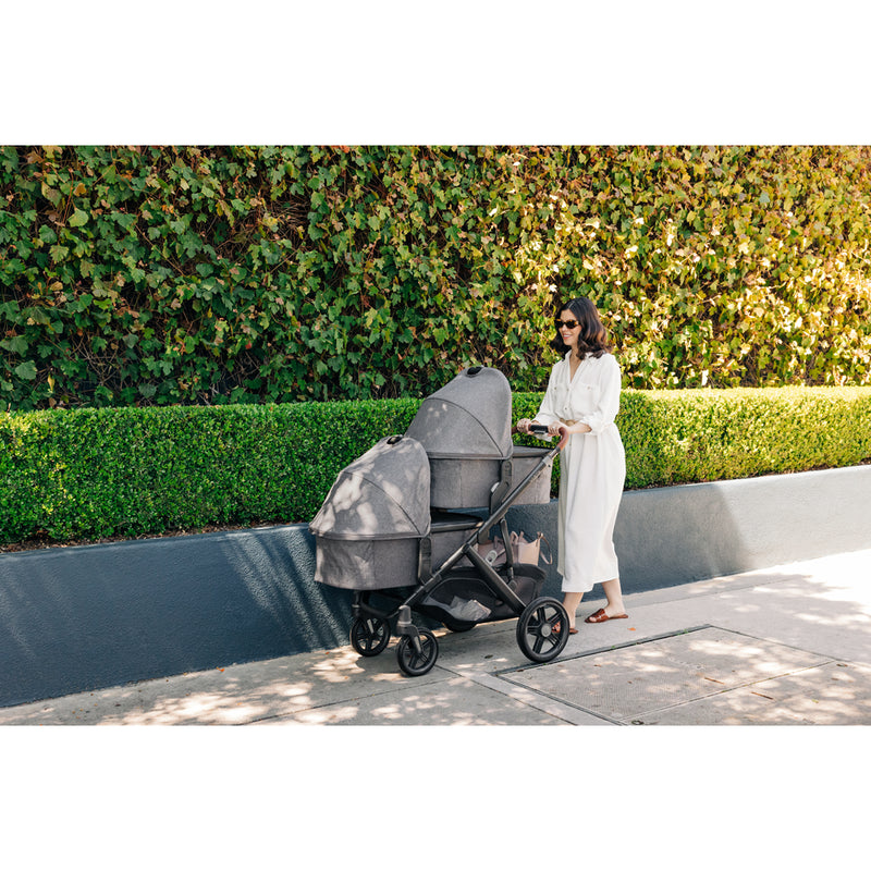 Family using the UPPAbaby Vista V3 Twin Double Stroller in Callum, an excellent travel system stroller for busy outings