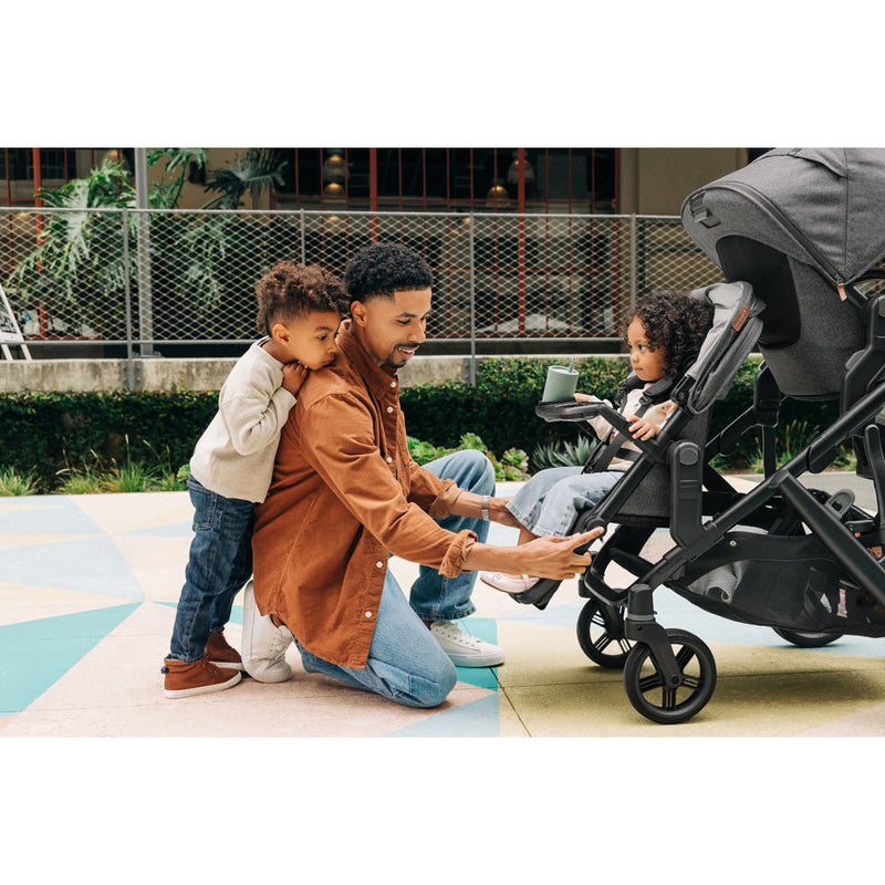 Street-level view of UPPAbaby Vista V3 Twin Double Stroller in Gwen, great for use as a stroller for twins