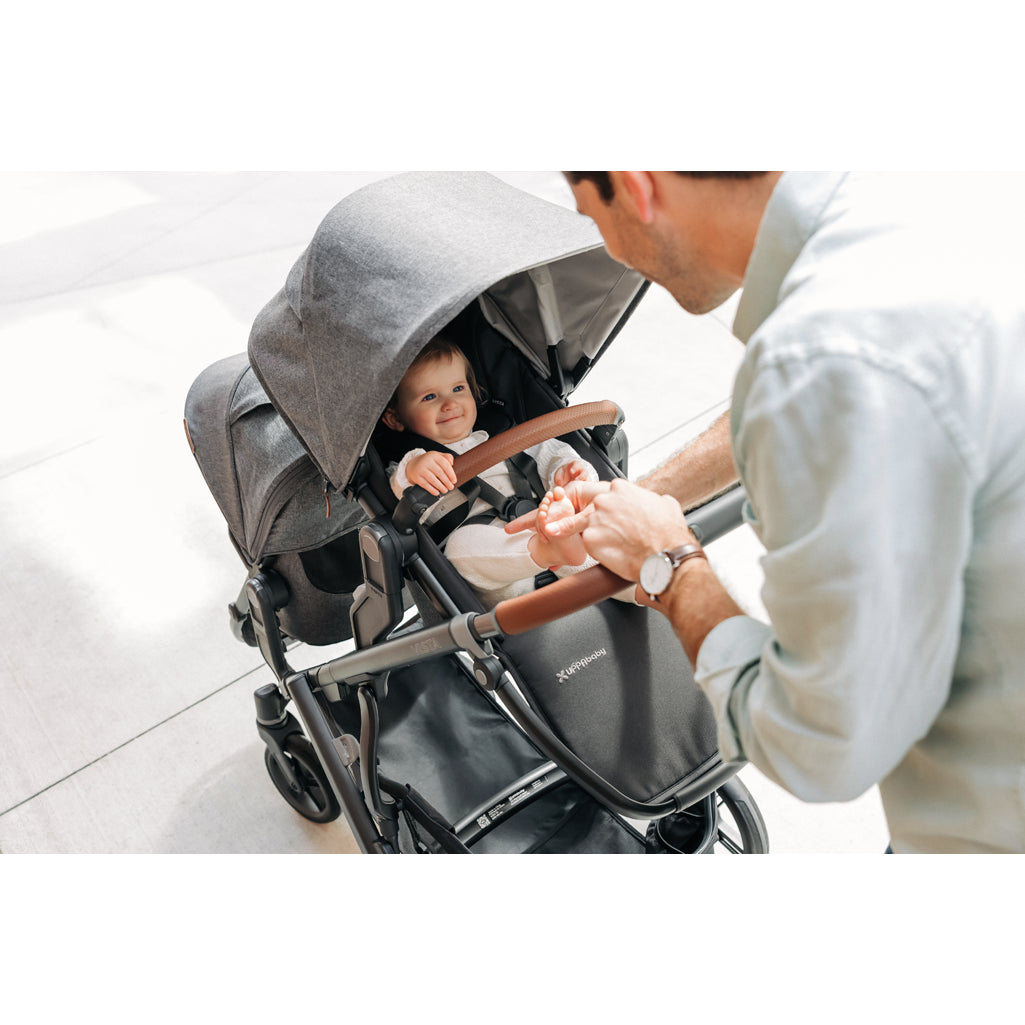 UPPAbaby Vista V3 Twin Double Stroller with dual toddler seats in use outdoors, modern stroller toddler seat setup