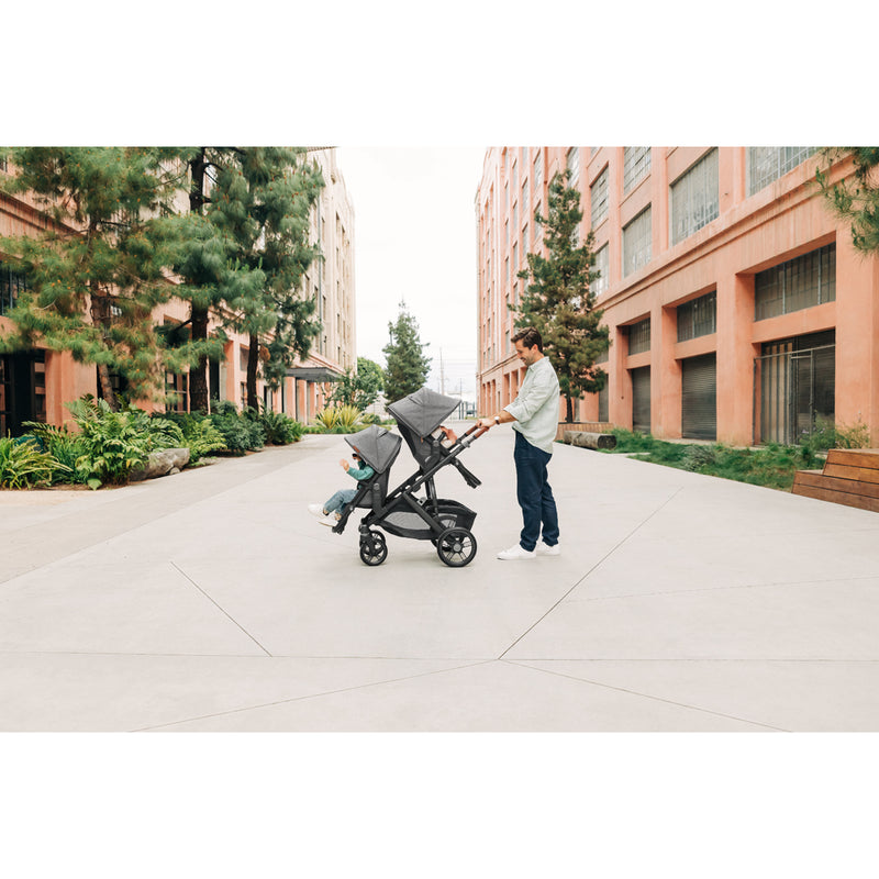 Urban setting with UPPAbaby Vista V3 Twin Double Stroller in Kenzi, adaptable lightweight stroller seat for busy families