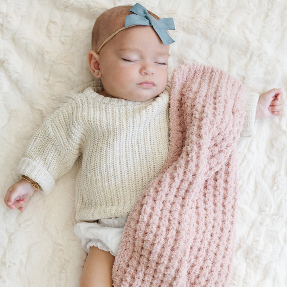 Cozy snuggles feel better with the Saranoni Waffle Knit Mini Blanket in Rosette, designed for Toddler blanket comfort.