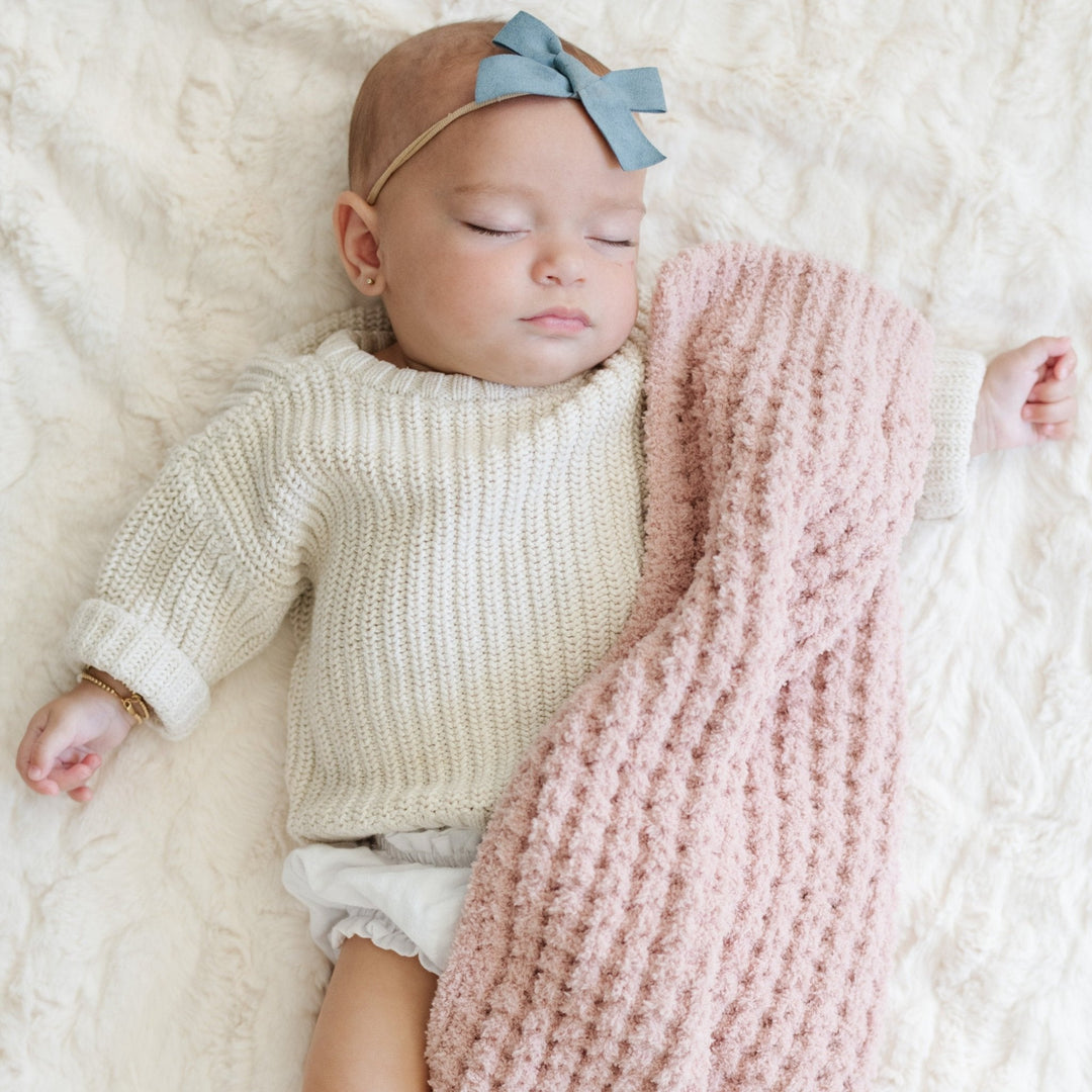Cozy snuggles feel better with the Saranoni Waffle Knit Mini Blanket in Rosette, designed for Toddler blanket comfort.