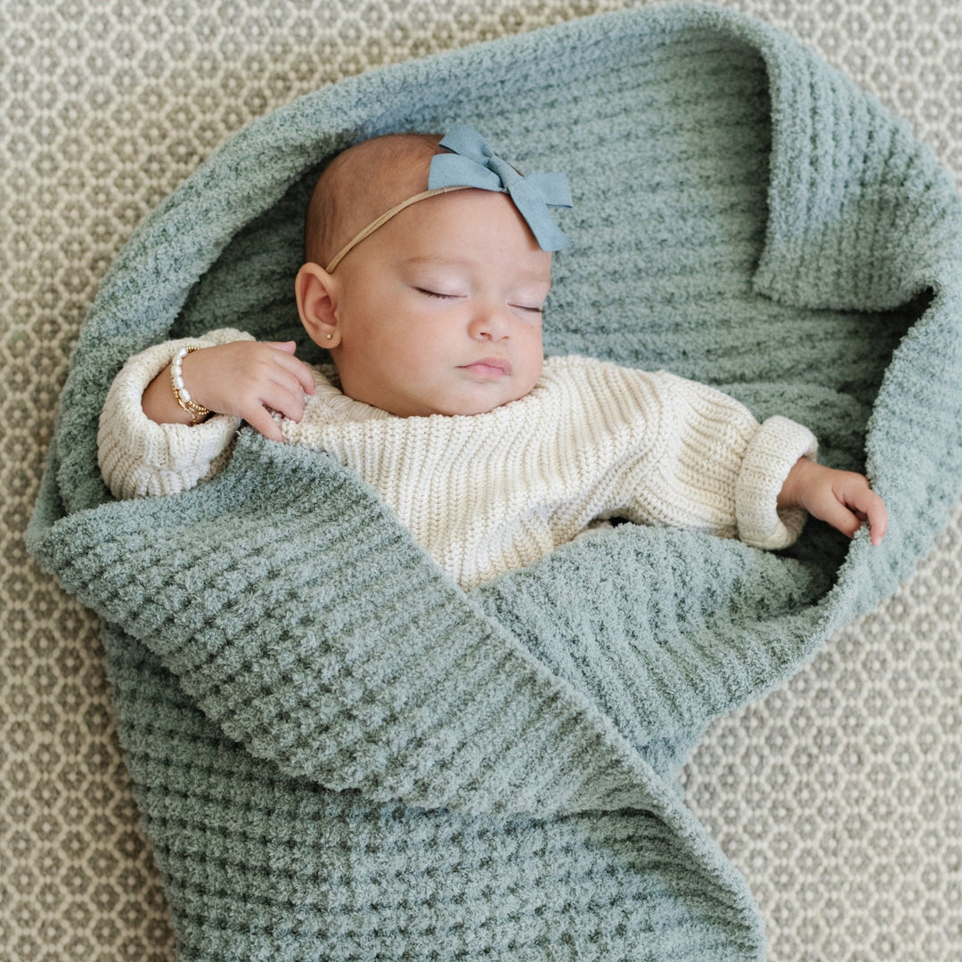 Saranoni Waffle Knit Receiving Blanket in Elm is a soft baby blanket ideal for swaddling.