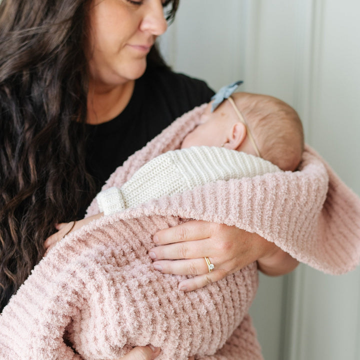 Rosette Saranoni Waffle Knit Receiving Blanket is a soft and gentle baby girl blanket for nursery use.