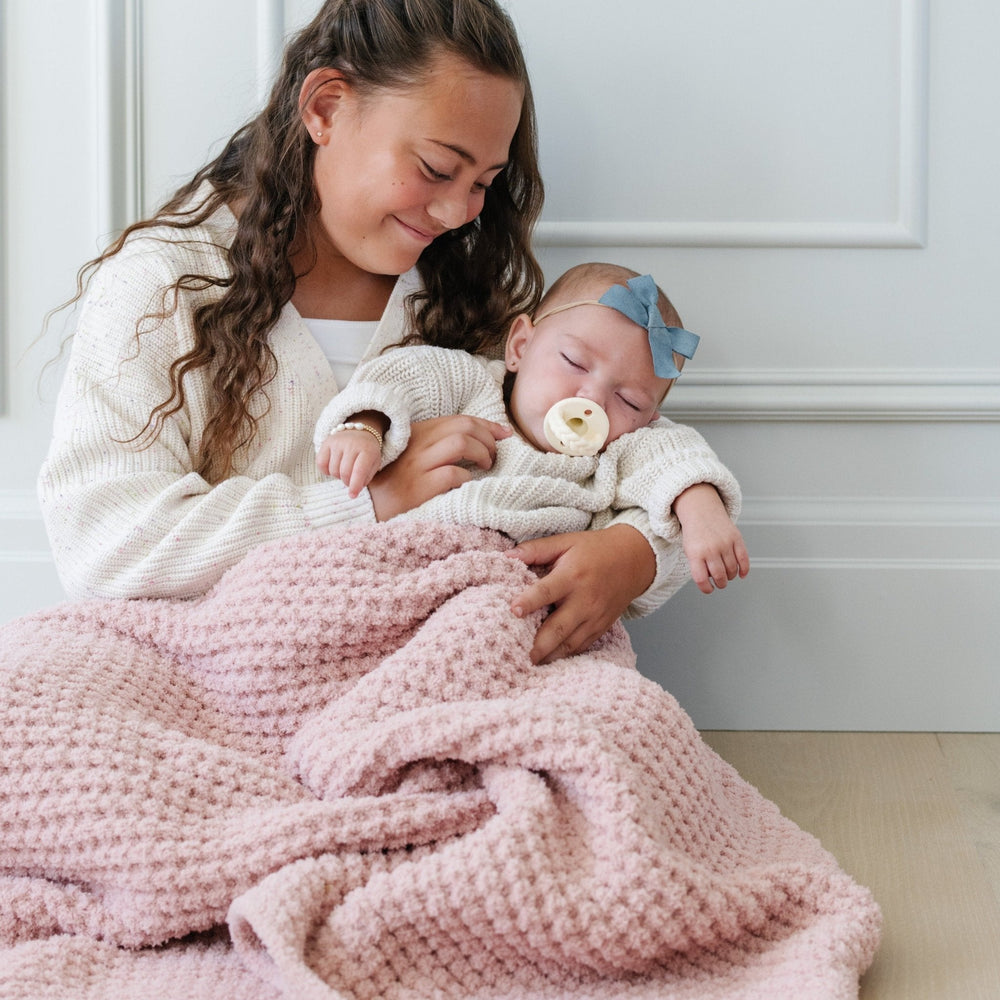 Wrap your little one in the Rosette Saranoni Waffle Knit Receiving Blanket, a cozy baby boy blanket.