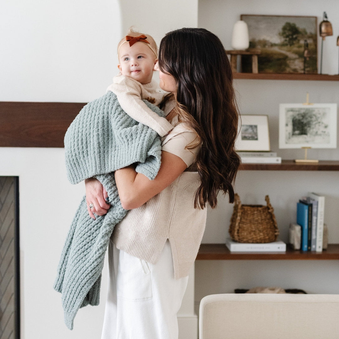 Elm Saranoni Waffle Knit Receiving Blanket offers a plush baby knit blanket for newborn comfort.