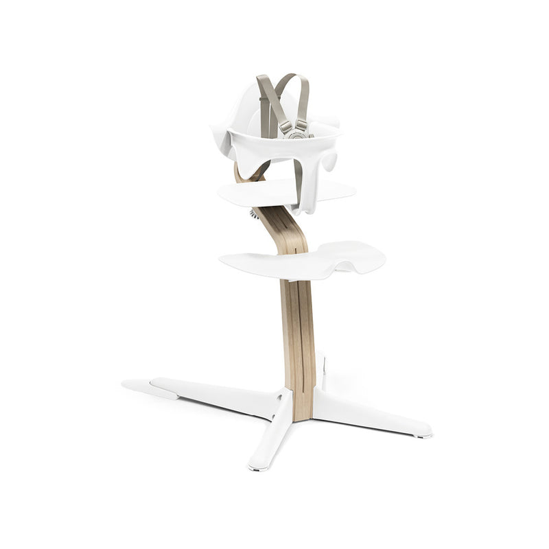 White natural stokke Nomi wooden high chair infant