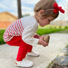 Toddler wearing the leather white Quinn Little Love Bug Co. shoes.