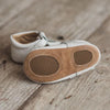 the anti slip soles of the white t-bars by  Little Love Bug Co.