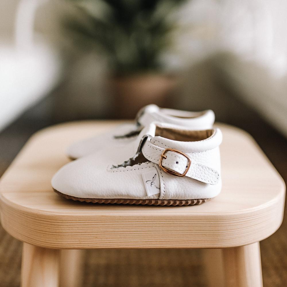 White organic leather t-bar shoes made by  Little Love Bug Co.