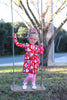 girl on swing, wearing the  Little Love Bug Co. white leather t-bar shoes.