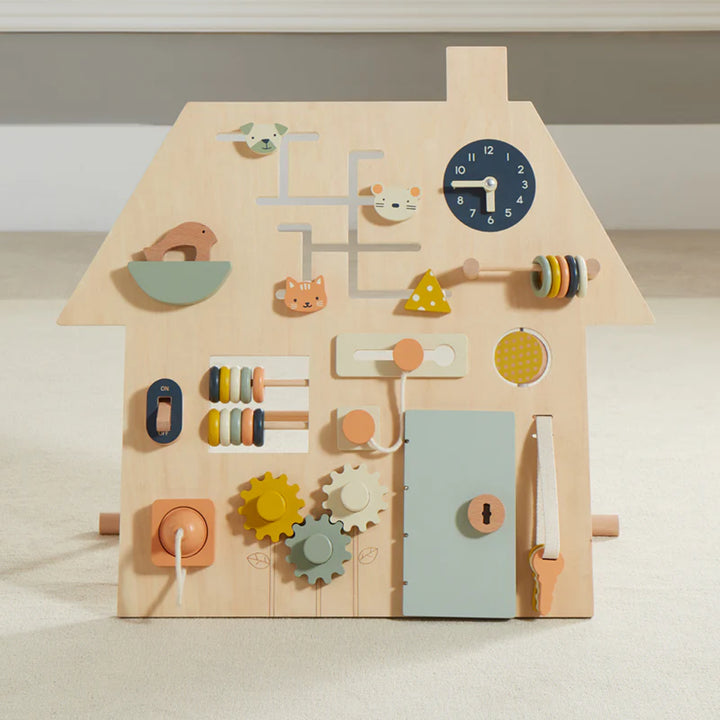 Wonder & Wise Busy Board wooden activity house on floor, Montessori sensory toy for toddler learning play