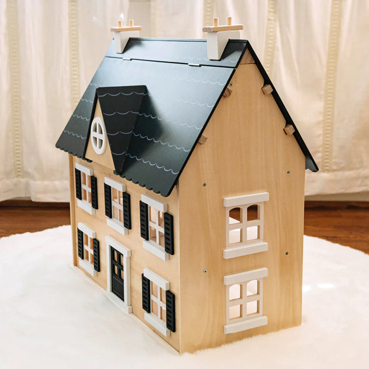 wooden wonder and wise toddler dollhouse with black shingle roof and shutters 