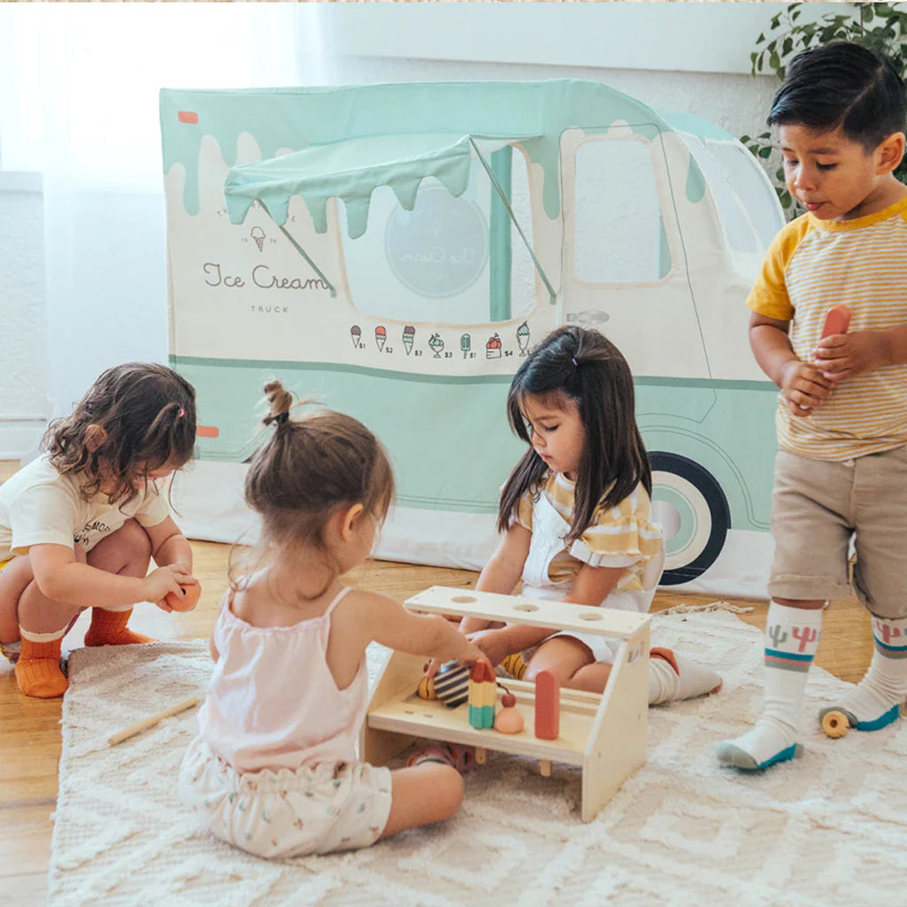 group of kids playing with wonder and wise pretend kitchen play wooden ice cream play set 