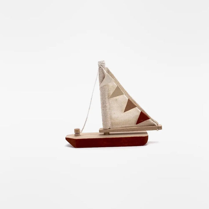 The Sabo Concept Wooden Boat is a charming wood toy for imaginative play.