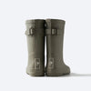 goumikids Artichoke Muddies Rain Boots Children's Rubber Boots. Olive green rubber rain boots for children. Goumi label debossed in white rectangle. Adjustable buckle on back of boot. Back view.
