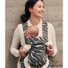mom smiling facing away in babybjorn baby carrier mini landscape