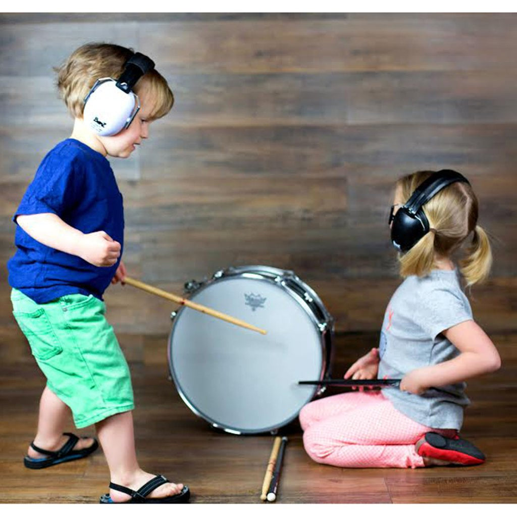 Young kids wearing Banz Hearing Protection Baby Earmuffs while drumming