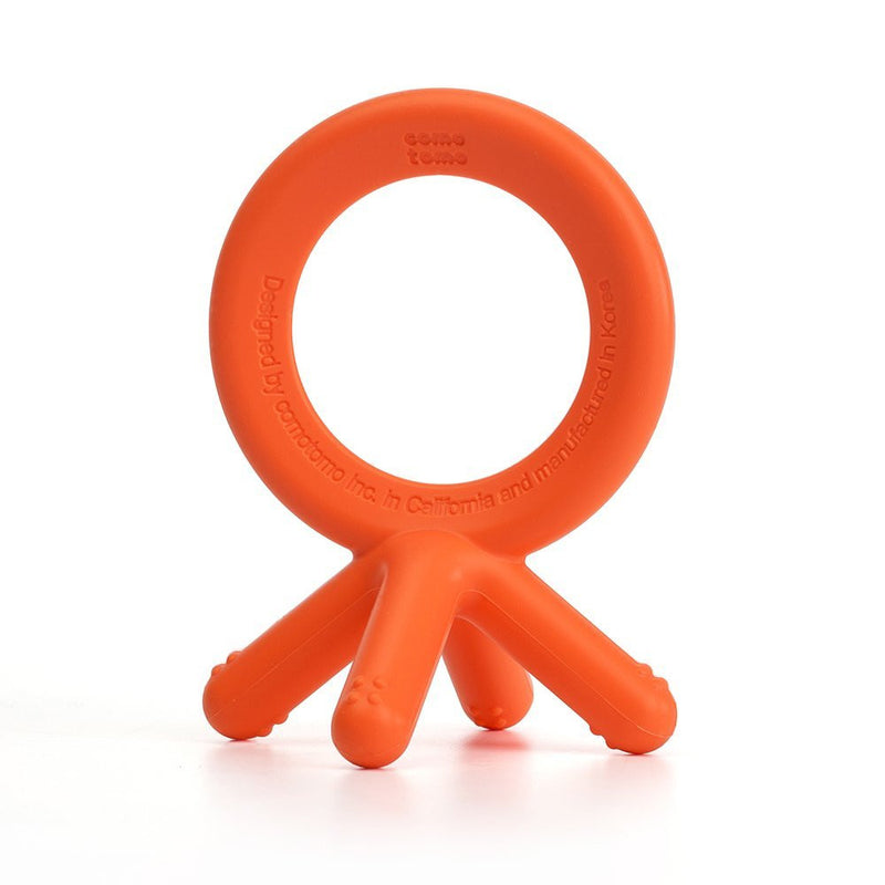 Comotomo silicone teether in orange for teething pain relief