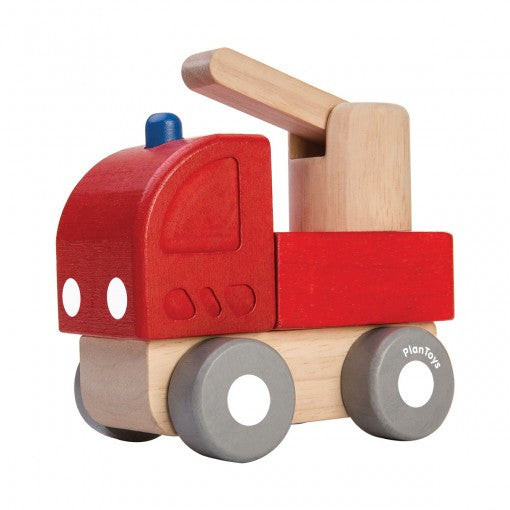 Red fire engine toy for kids made of sustainable wood by PlanToys.