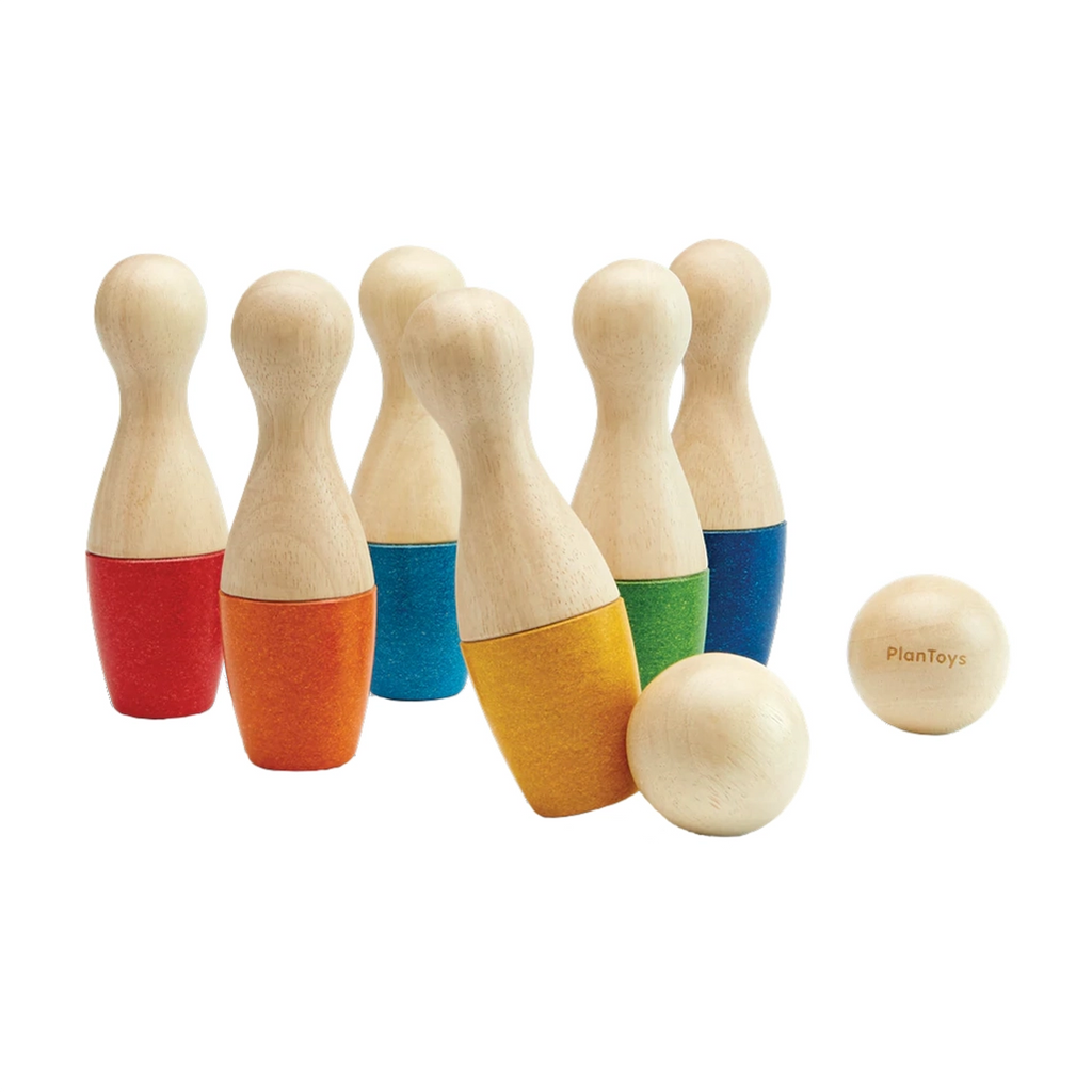 PlanToys Colorful Bowling Set Children's Sports Activity Toy Set. Six pin, two ball wooden bowling toy set. Bowling balls are natural in color. Pins are half natural, half color. 