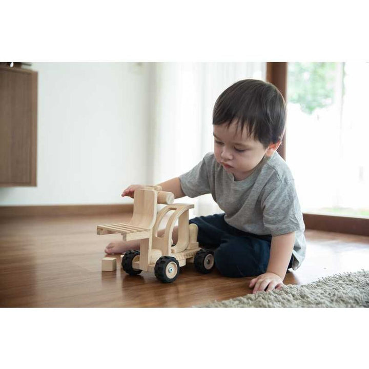 Kids toy fire truck from PlanWood, designed with natural wood to spark creativity and learning.