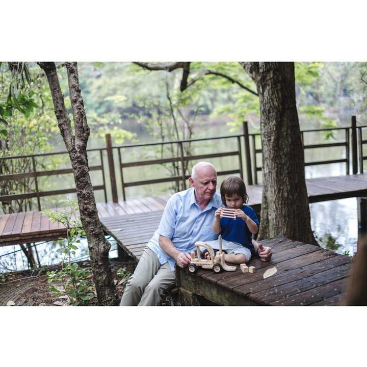 Wooden toys from PlanWood, fire truck toy ideal for toddlers to develop motor skills.