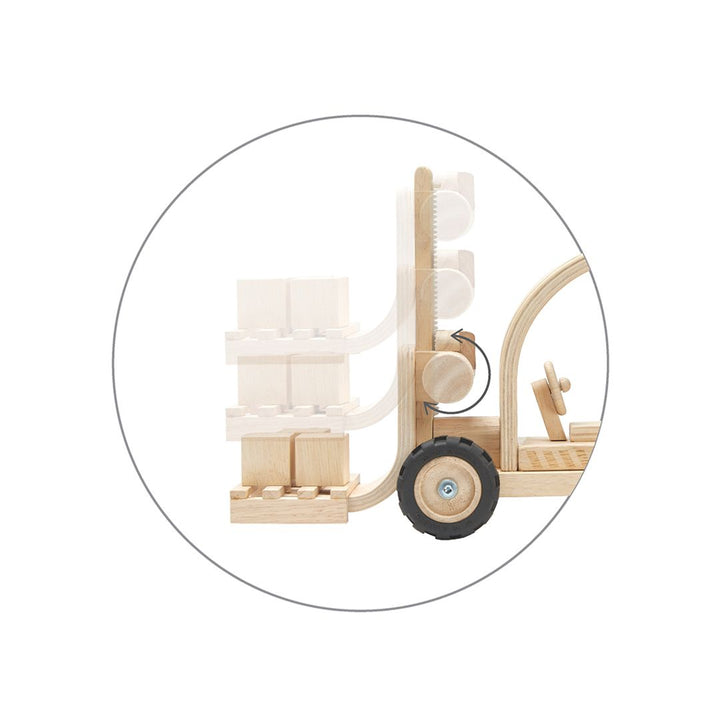 Montessori toys from PlanWood, a fire truck made with eco-friendly wood for young learners.