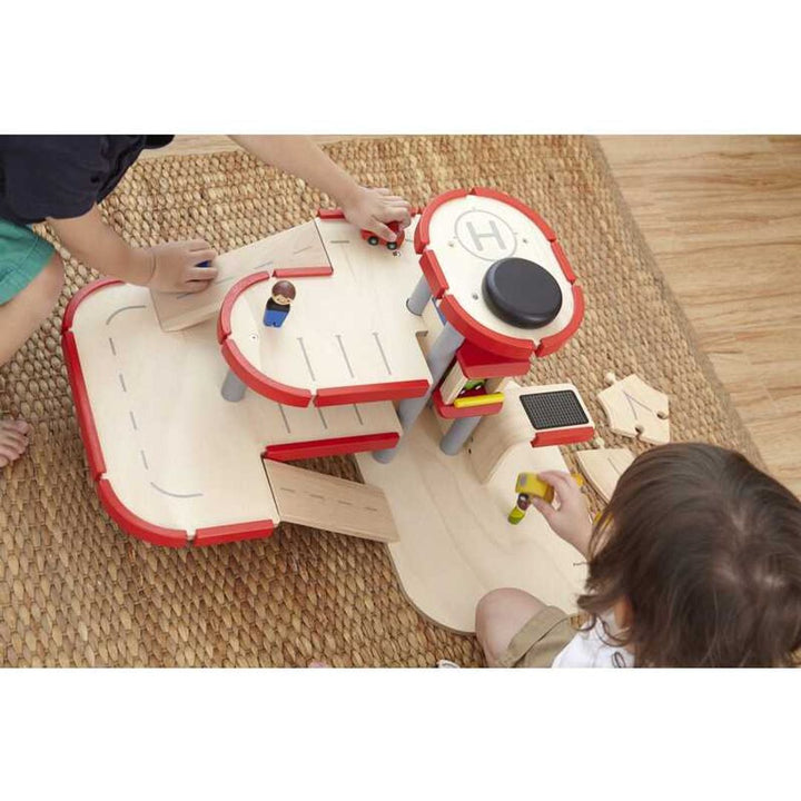 Let your child explore with the Plantoys Parking Garage, a best toddler toy for learning and play.