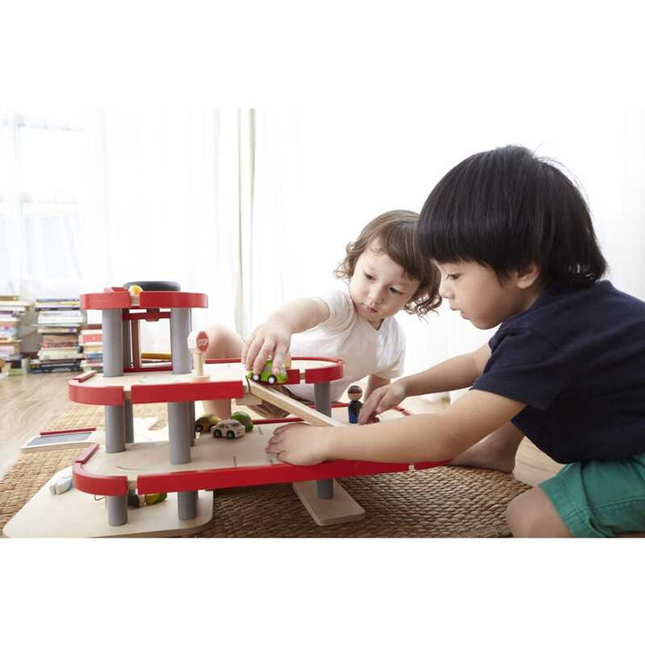 Endless fun awaits with Plantoys Parking Garage, a kids toy perfect for active young learners.