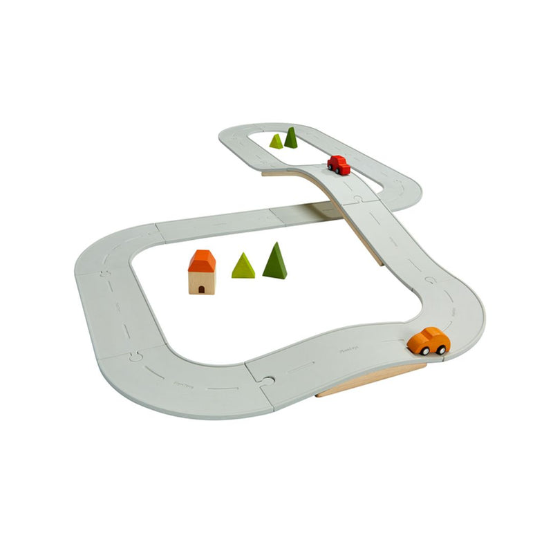Top view of Plantoys Rubber Road & Rail Set - Large, an interactive educational toy for kids.