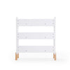 dadada White & Natural Muse Children's Nursery Bookshelf. White, three shelf bookcase with natural colored legs. Back view.