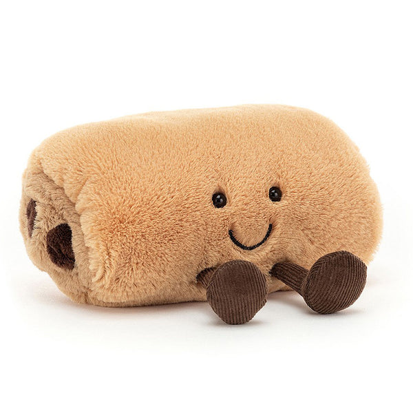 Jellycat Amuseable Pain Au Chocolat. Sweet golden brown pastry with chocolate brown suede center and booties. Cute smile with shiny black button eyes. Height four inches and width six inches.