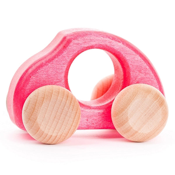 A vibrant pink wooden toy car by BAJO, perfect for girls or boys.