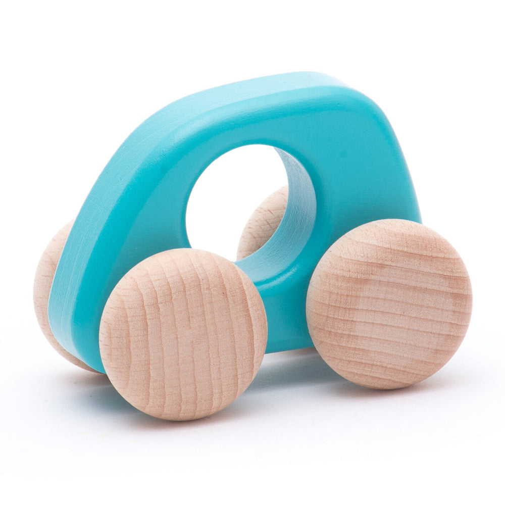 Pink wooden mini car toy by BAJO, designed for young kids.