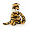 Small bashful tiger stuffed animal.