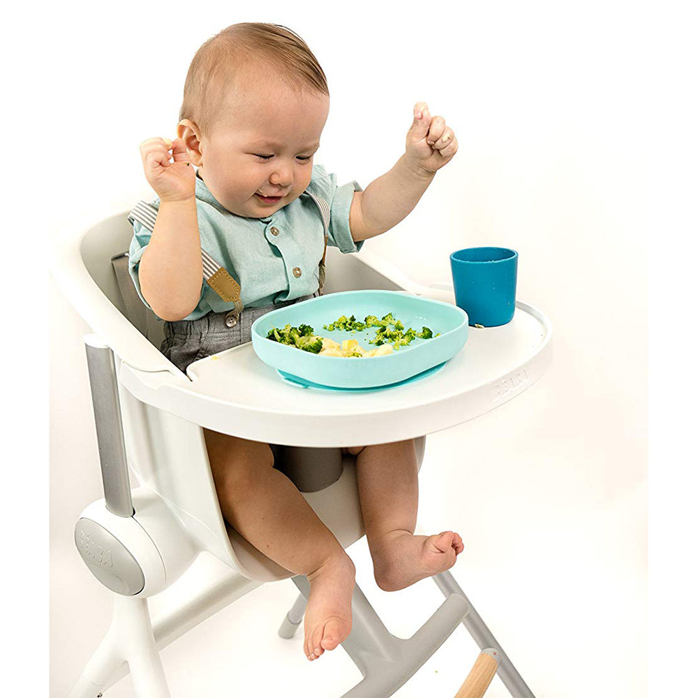 Baby Eating from Béaba Silicone Children's Suction Bottom Plate