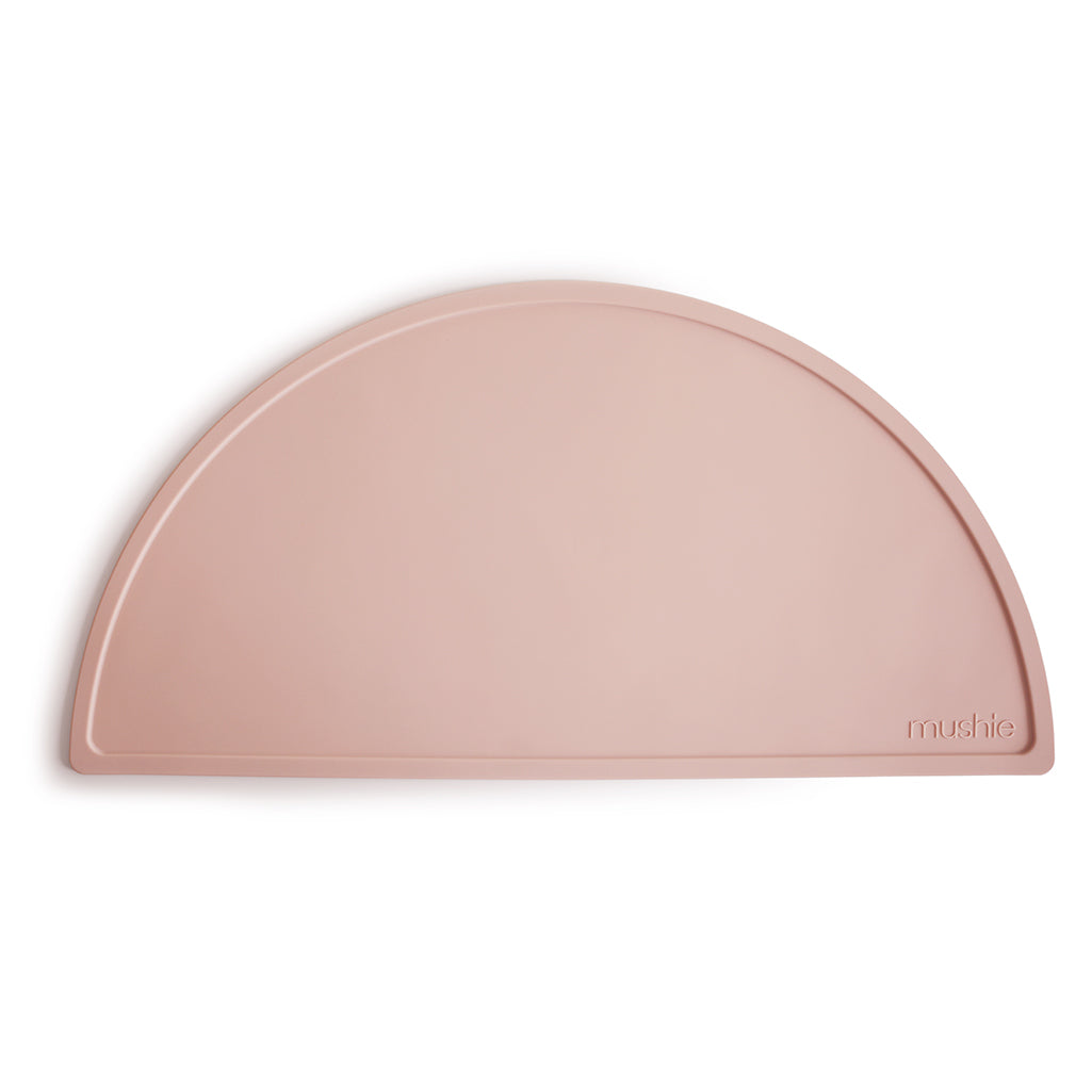 Mushie Silicone Placemats in Blush A gentle pastel pink shade that adds a sweet touch to any mealtime