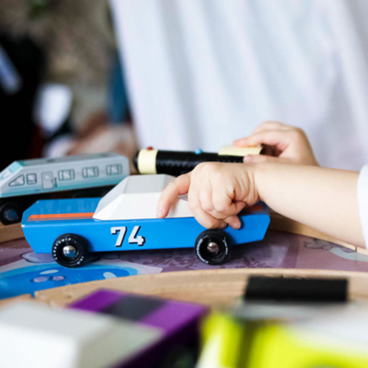 Child Playing with Candylab Blu 74 Car Kid's Wooden Toy, Encouraging Imaginative Play