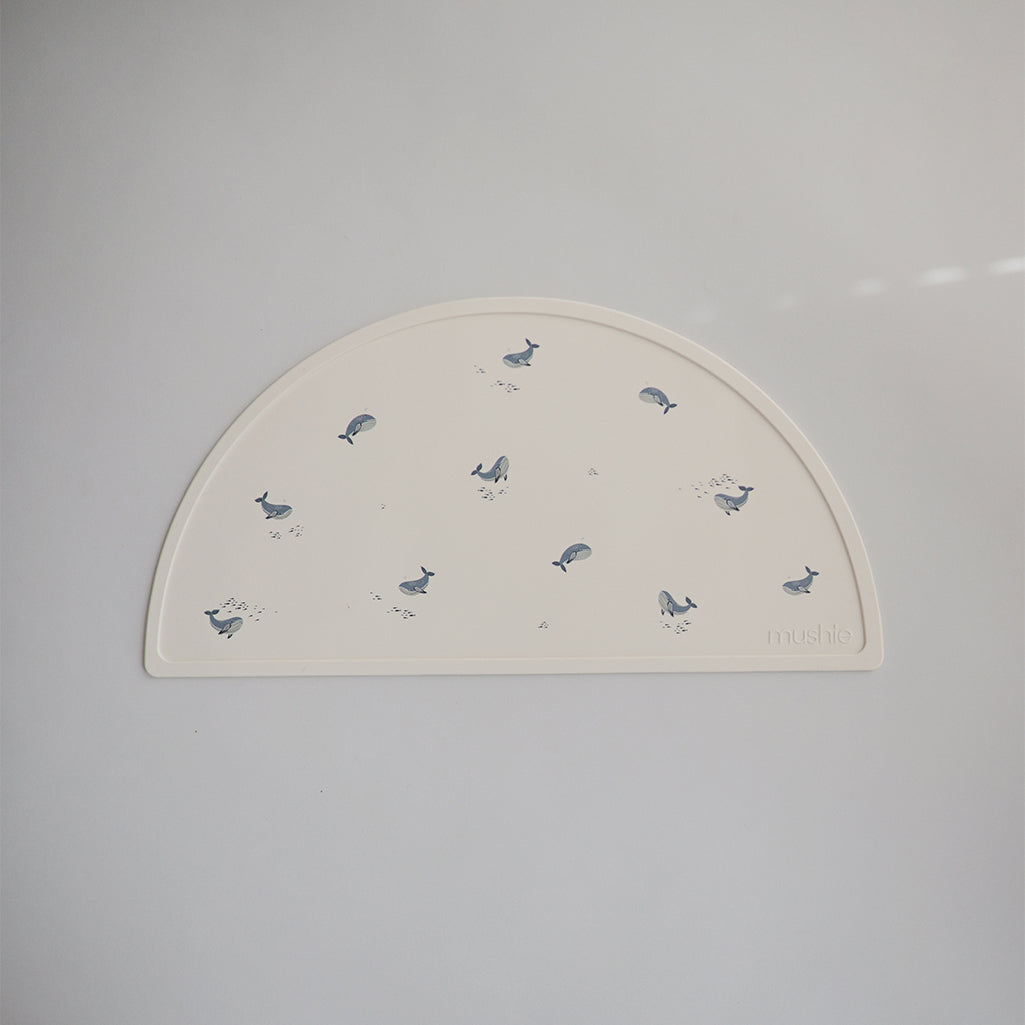 Mushie Baby Placemats in Blue Whale Adorable whale designs that bring a bit of the ocean to your dining space