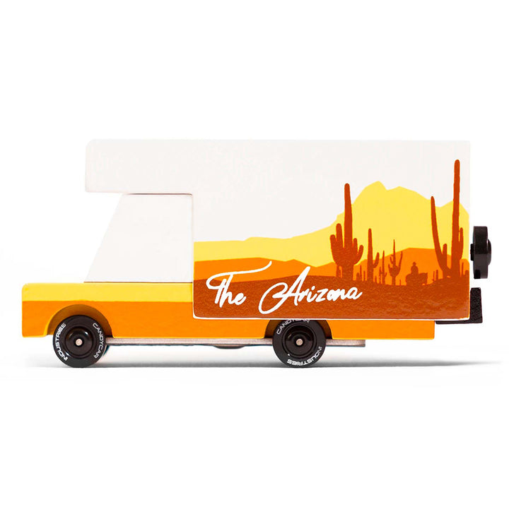 Side view of the Candylab Desert Arizona RV in wooden yellow and orange.