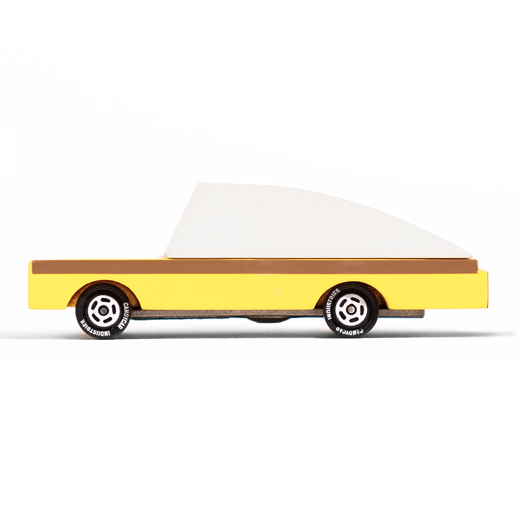 Side profile of Candylab's quirky banana car, the B.Nana vehicle.