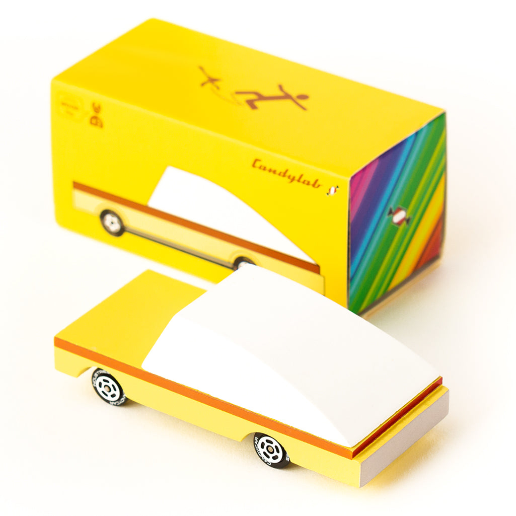 Candylab's banana-inspired wooden car toy, perfect for fruity fun.